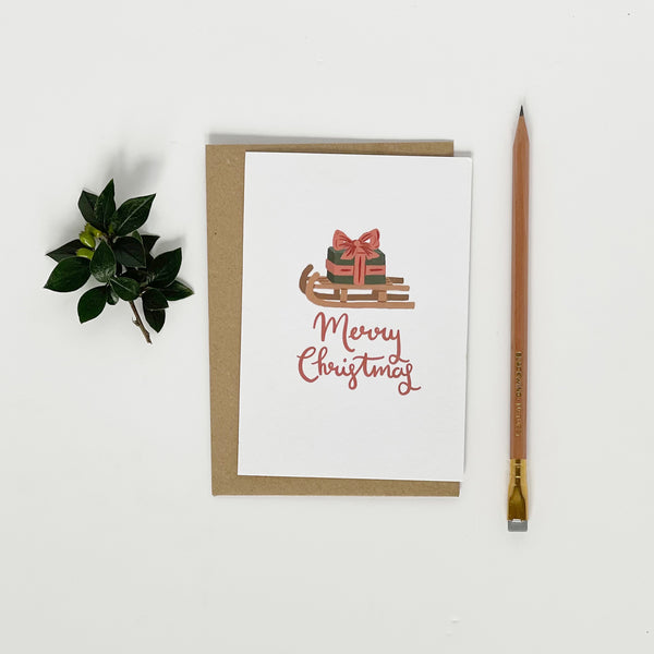Dachshund pulling a Sledge Merry Christmas Card Pack
