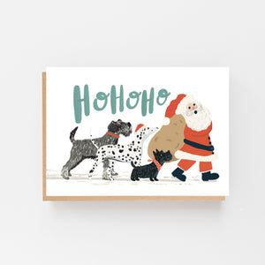 Dogs following Santa - Ho Ho Ho Christmas Card