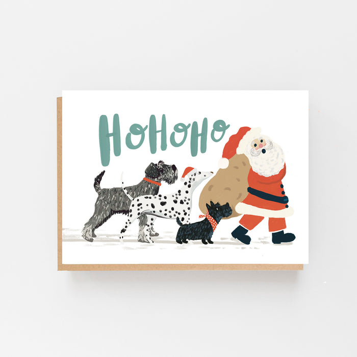 Dogs following Santa - Ho Ho Ho Christmas Card