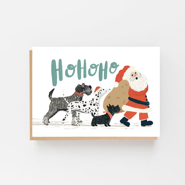 Dogs following Santa - Ho Ho Ho Christmas Card