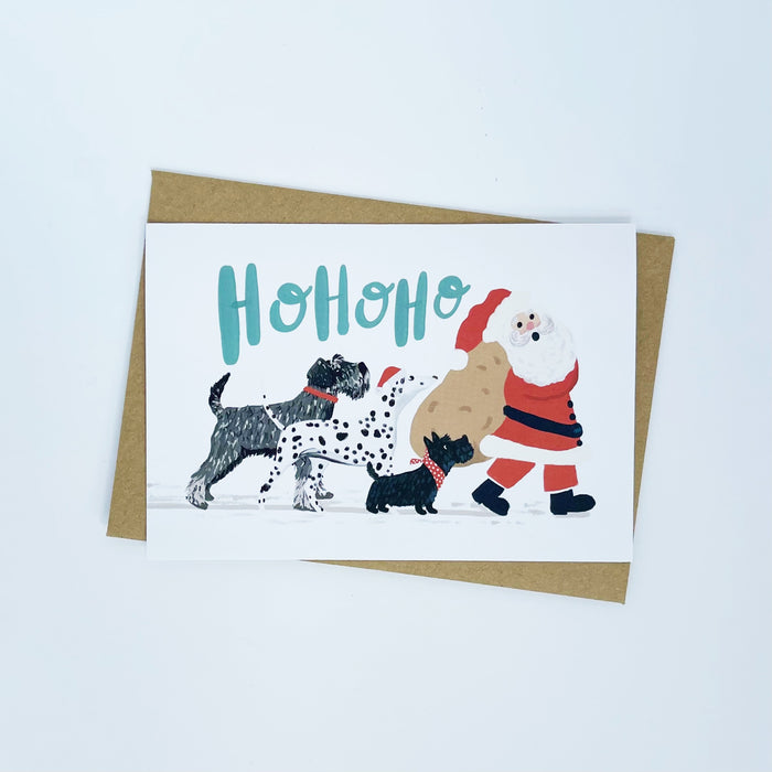 Dogs following Santa - Ho Ho Ho Christmas Card