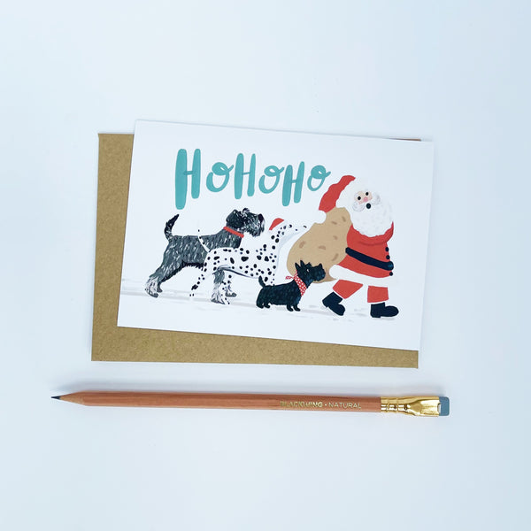 Dogs following Santa - Ho Ho Ho Christmas Card