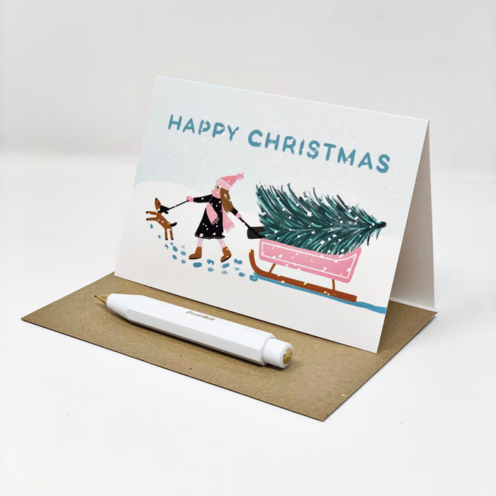 Girl with Pink Sledge - Happy Christmas