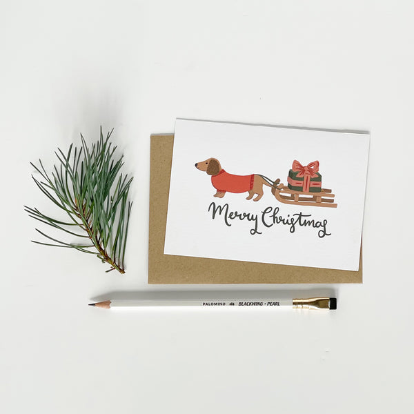 Dachshund pulling a Sledge Merry Christmas Card Pack